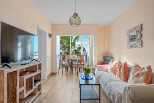 Et tv og/eller underholdning på MEDANO4YOU Oceanview Medano Center