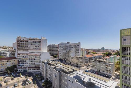 an overhead view of a city with tall buildings at Eua 112 II in Lisbon