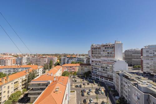 an aerial view of a city with tall buildings at Eua 112 II in Lisbon