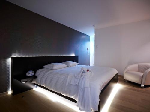 Una cama o camas en una habitación de B&B Aquabello