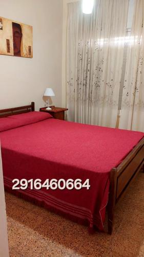 En eller flere senge i et værelse på Atenea