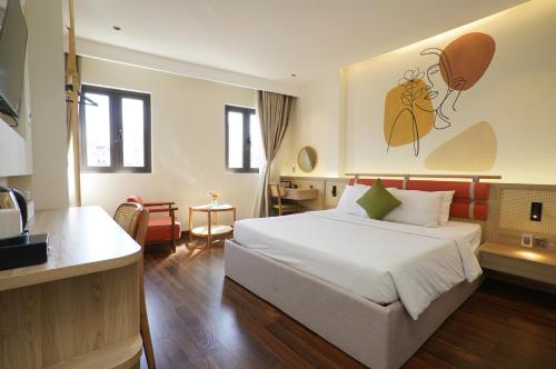 En eller flere senge i et værelse på Nicecy Daily - Bến Thành Market