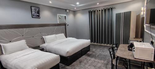 Imagen de la galería de AZHAAR Suites اجنحة ازهار للشقق المفروشة, en Medina