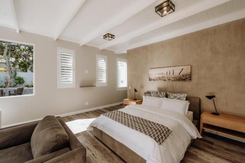 Giường trong phòng chung tại Coats Haven