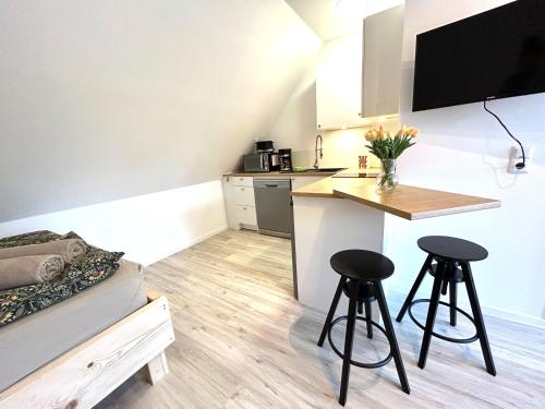 Кухня или мини-кухня в Ferienwohnung Loft Kirchdorf
