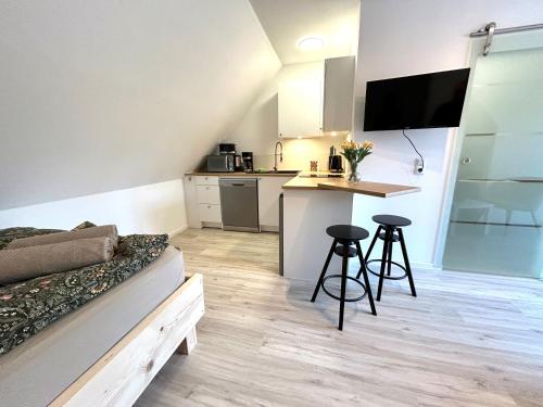 Кухня или мини-кухня в Ferienwohnung Loft Kirchdorf
