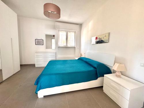 En eller flere senge i et værelse på Verdeacqua my villa in the pinewood