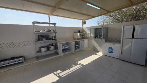 Kuchyň nebo kuchyňský kout v ubytování Karam rak farm