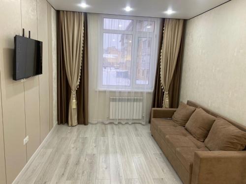 Een TV en/of entertainmentcenter bij Кокшебель Жк
