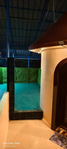 Swimmingpoolen hos eller tæt på Mushroom at Makam