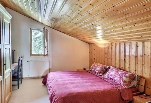 Postel nebo postele na pokoji v ubytování Grand appart confortable au cœur des Diablerets