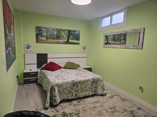 En eller flere senge i et værelse på Villa Maritxu