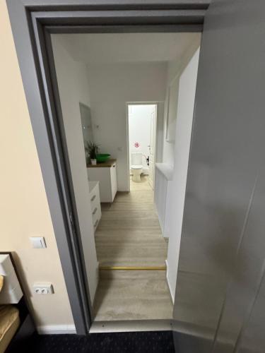 a view of a hallway with a stairway at Udroiu Residence 2 in Craiova