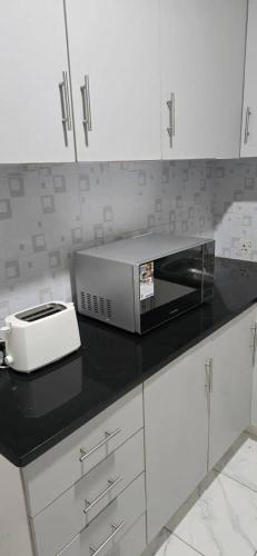 Cuina o zona de cuina de Hungwe Apartment