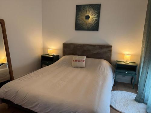 Postel nebo postele na pokoji v ubytování Les Trinitaires