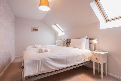 En eller flere senge i et værelse på North Quarter Steading No 11 - Kingsbarns