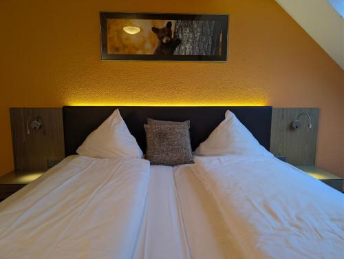 Ένα ή περισσότερα κρεβάτια σε δωμάτιο στο Gasthaus Bären Kölliken