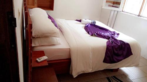 Postel nebo postele na pokoji v ubytování Résidence Hôtelière l'Océane