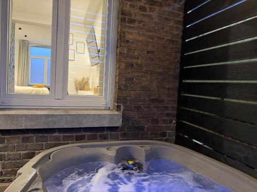 Billede fra billedgalleriet på Suite Luxueuse avec jaccuzi sans vis-à-vis i Liège
