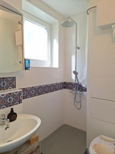 Et badeværelse på Bruno Apartment