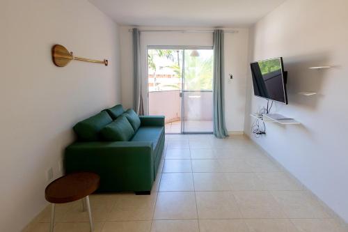 Et tv og/eller underholdning på Apto Pe na Areia em Ilheus - Cond Praia da Perola