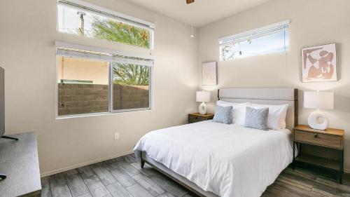 En eller flere senge i et værelse på Landing Apartments - Port Wentworth