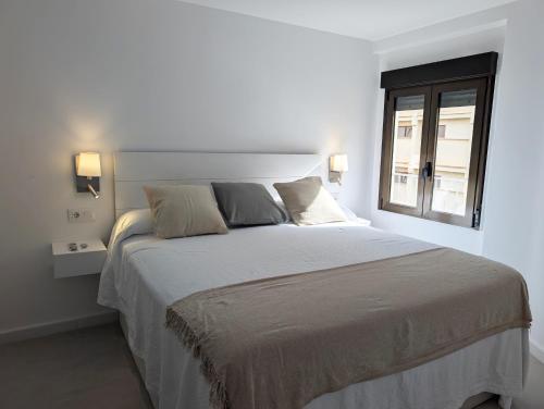 Postel nebo postele na pokoji v ubytování Modern apartment 2 minutes from Benicàssim beach