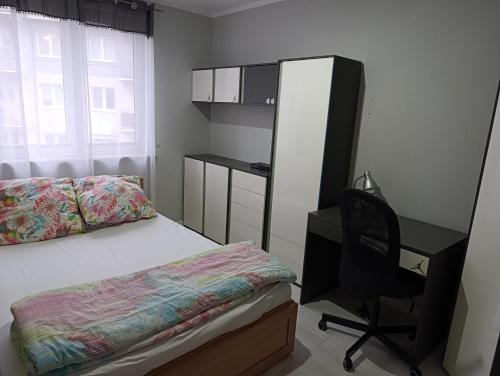 Postel nebo postele na pokoji v ubytování Apartament Barbara