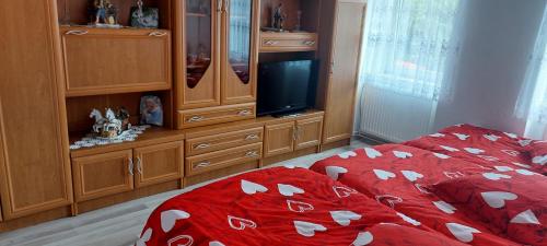 En eller flere senge i et værelse på Casă Ghimbav -Brasov