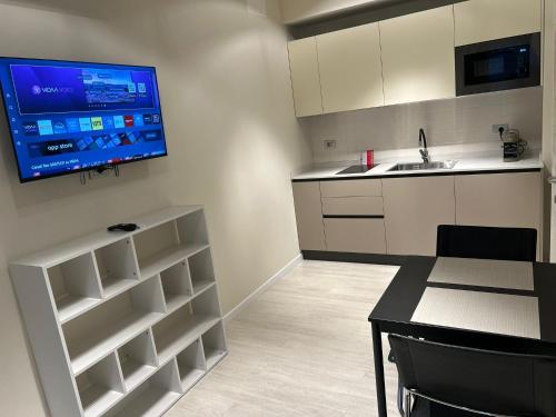 Η κουζίνα ή μικρή κουζίνα στο CARPI SUITE - Minghetti House