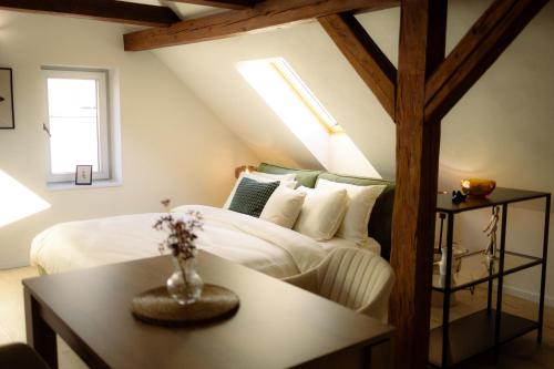 Ένα ή περισσότερα κρεβάτια σε δωμάτιο στο Apartmán Pod Trámy