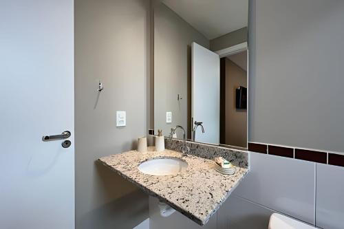 Et badeværelse på Espetacular Praia 24HRS [LUXO]