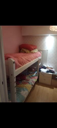 En eller flere senge i et værelse på Mariano decar