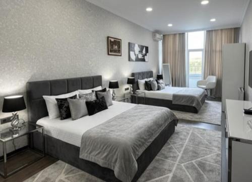 Ένα ή περισσότερα κρεβάτια σε δωμάτιο στο Centrally Located Hotel