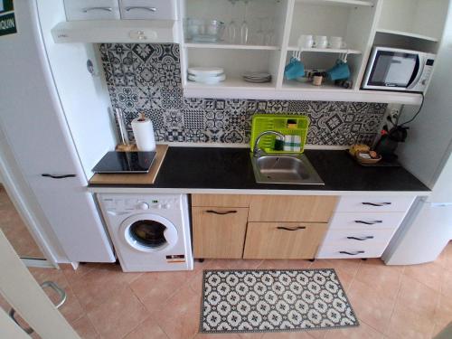 Nhà bếp/bếp nhỏ tại Apartamento 30 m al mar maravillosa vista mar, playa, piscina