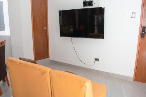 Et tv og/eller underholdning på Apart Hotel Alojate Kaypi