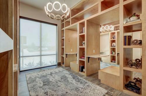 a large room with a large window and a large rug at Blueground Austin pool nr Walnut Creek ATX-258 in Austin