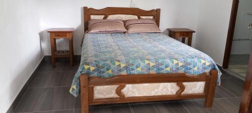 En eller flere senge i et værelse på Hermosa vista de Samaipata