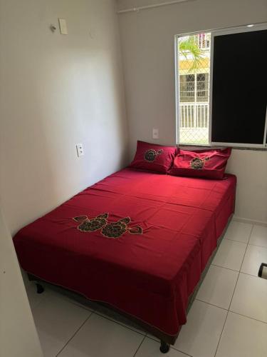 En eller flere senge i et værelse på Apartamento térreo em condomínio 24 hrs