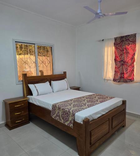 Giường trong phòng chung tại JEK Villa