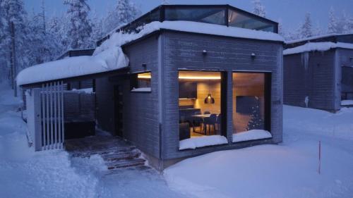 a small house in the snow in the yard at Levi Lapland Luxury Igloos D in Levi