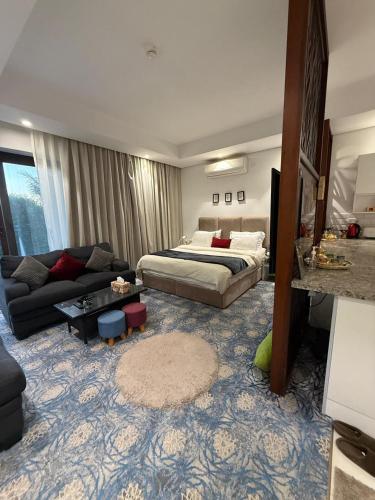 Ένα ή περισσότερα κρεβάτια σε δωμάτιο στο أطلالة هوانا