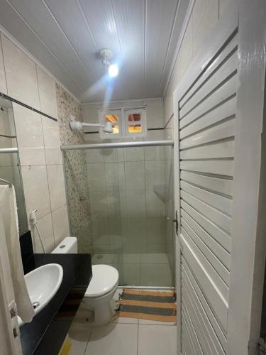 Phòng tắm tại Pousada Sapê