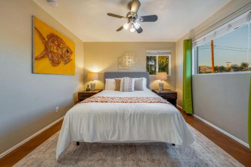 a bedroom with a bed and a ceiling fan at Santa Rita Primary (Mike Morgan) in Tucson