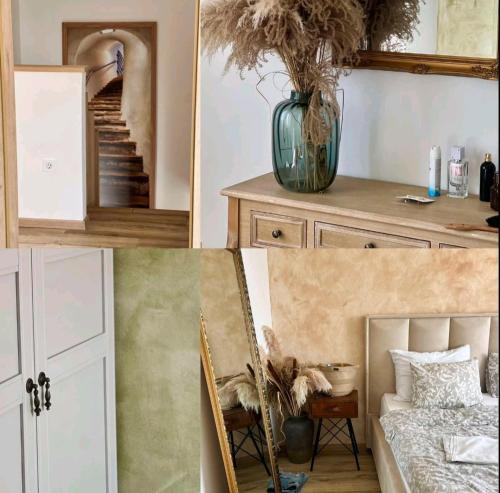 a room with a staircase and a table with a chair at Guest house Noemi in Marčana