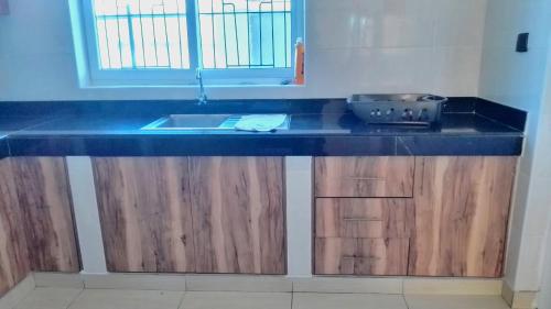 Kuchyň nebo kuchyňský kout v ubytování Seasalt & Sand