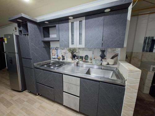 Kuchyň nebo kuchyňský kout v ubytování Relax Inhouse