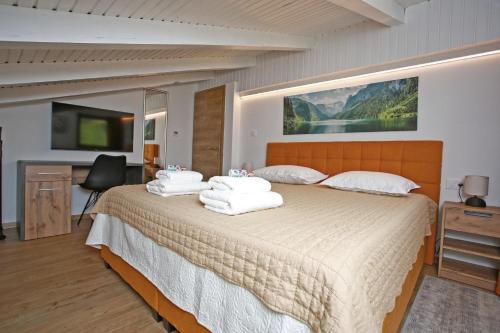 En eller flere senge i et værelse på House Sopra di Lago