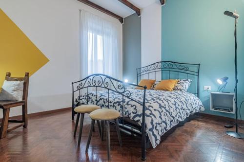 Ένα ή περισσότερα κρεβάτια σε δωμάτιο στο Al Civico 11, nel cuore della piazza principale di Lainate, minimal e confortevole, comodo per Rho Fiera Milano