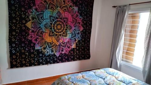 En eller flere senge i et værelse på Cabaña Da Noi